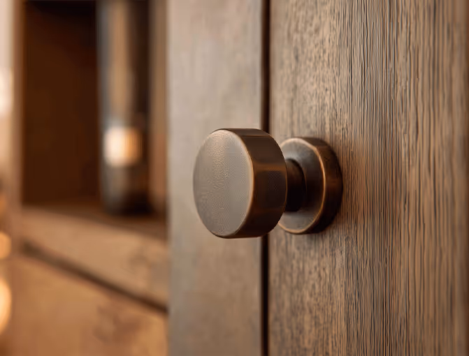A close up of a metal doorknob