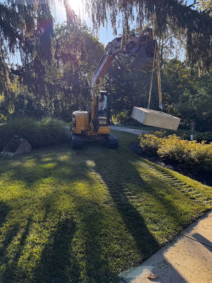 Crane lifting concrete slab