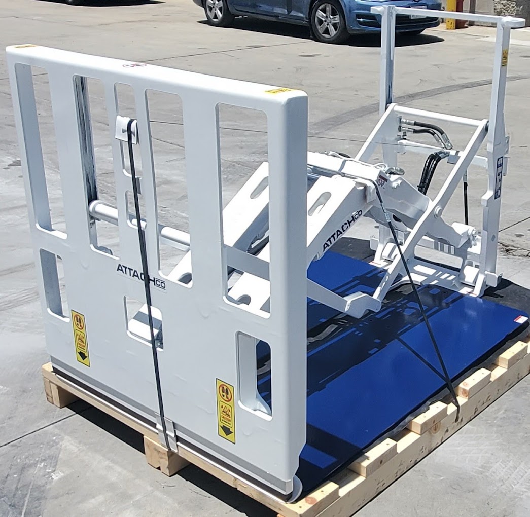 AttachCo Push Pull forklift attachment with hydraulic gripper for slip sheet handling