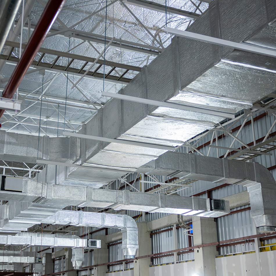 Industrial HVAC ductwork system installed in a large commercial building
