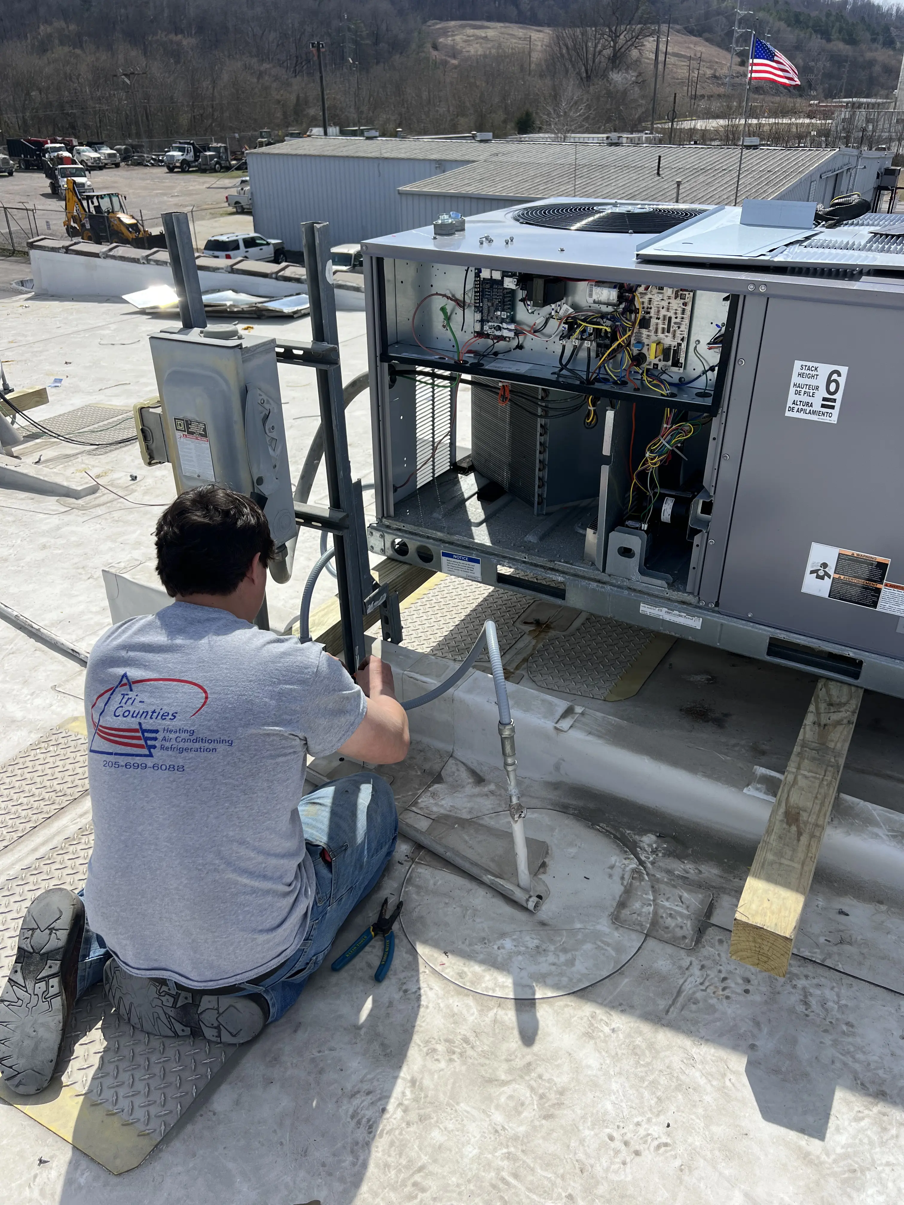 NATE-certified HVAC technician performing air conditioning repair in Leeds, AL