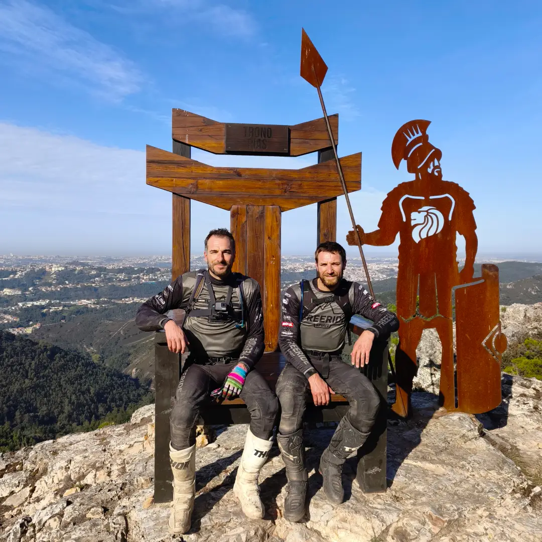 Riders posing on the viewpoint on the track