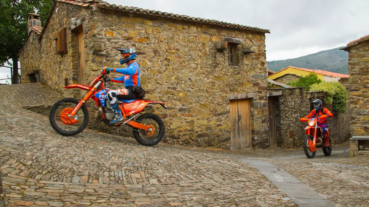 Riders leaving the Schist village