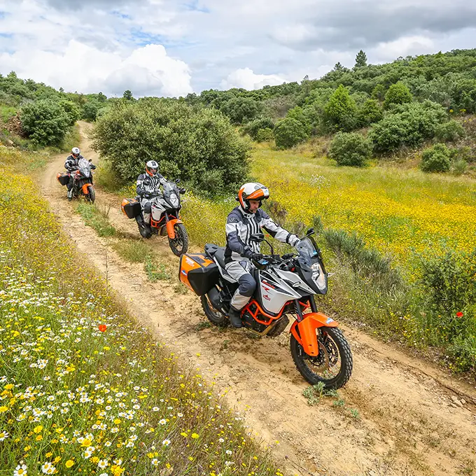 Riders on adventure bikes off-road