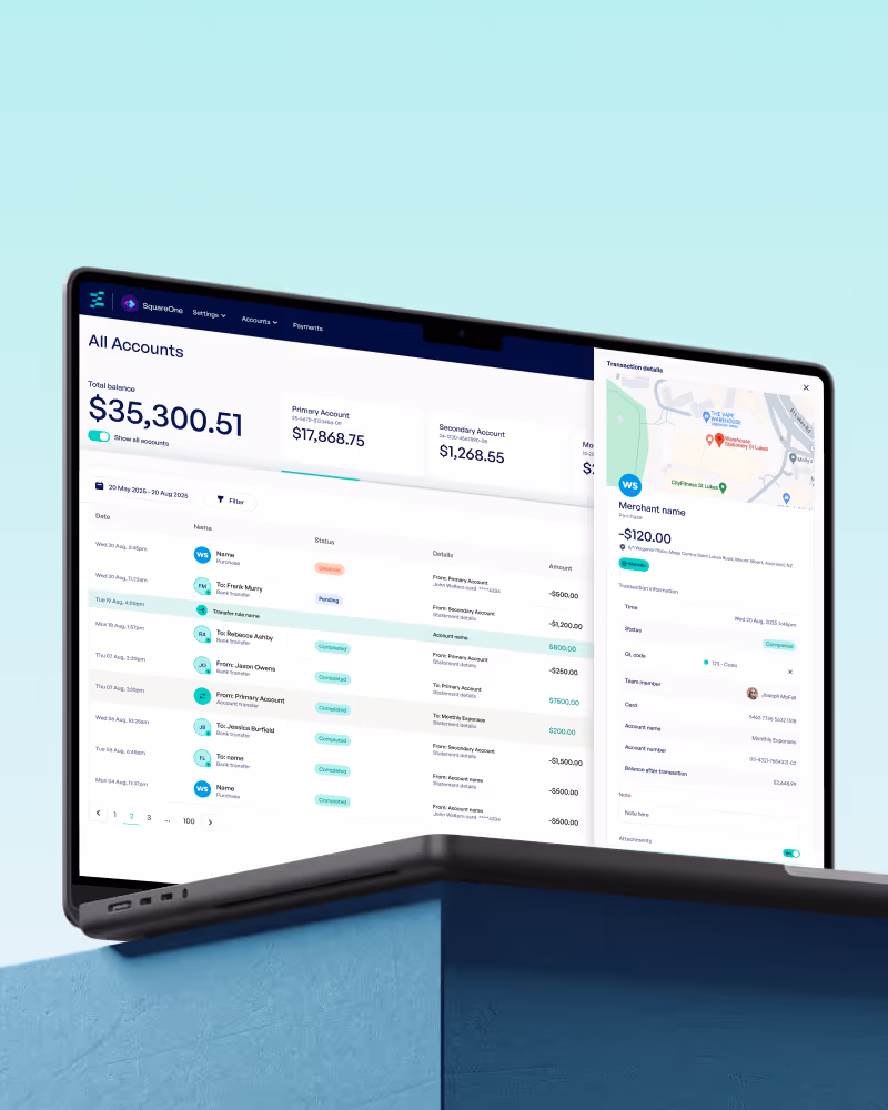 Laptop screen displaying a financial account dashboard showing total balance, account details, transactions list, and transaction details with map.