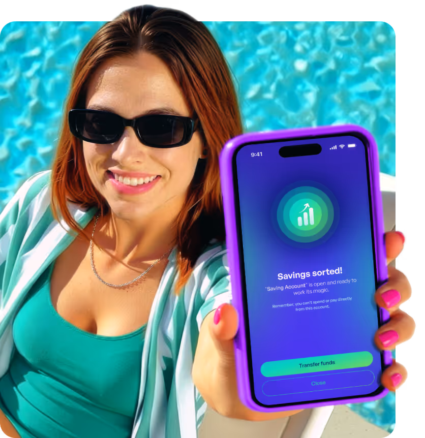 Smiling woman in sunglasses holding a smartphone displaying a savings account app with message 'Savings sorted!' by a pool.
