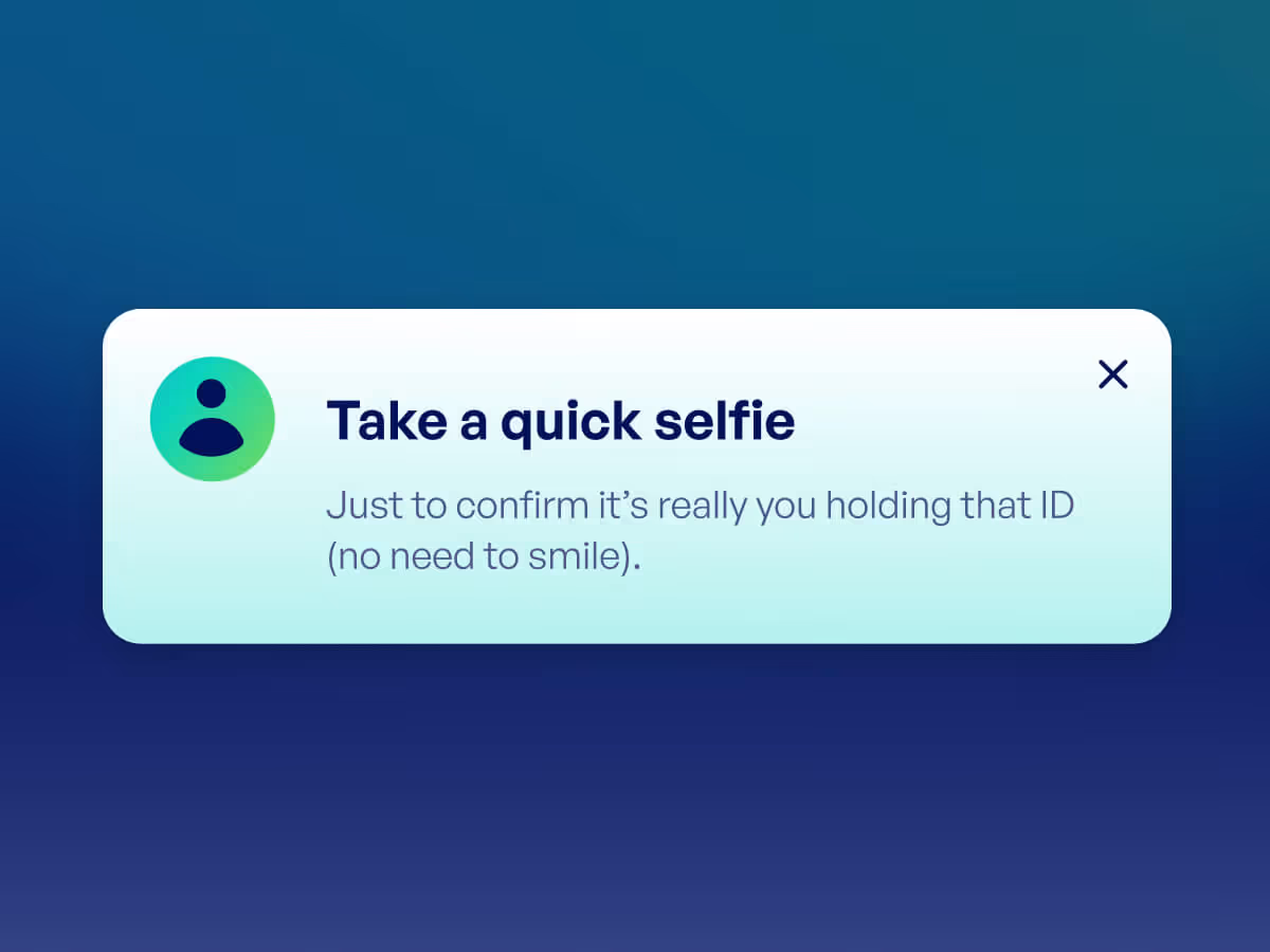 Notification box with message: Take a quick selfie. Just to confirm it’s really you holding that ID (no need to smile).