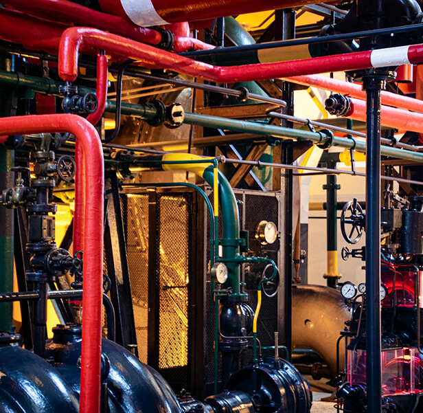 A room with pipes and engines.