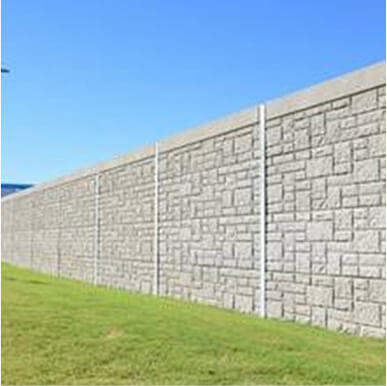 A shot of the wall with grassy fields.