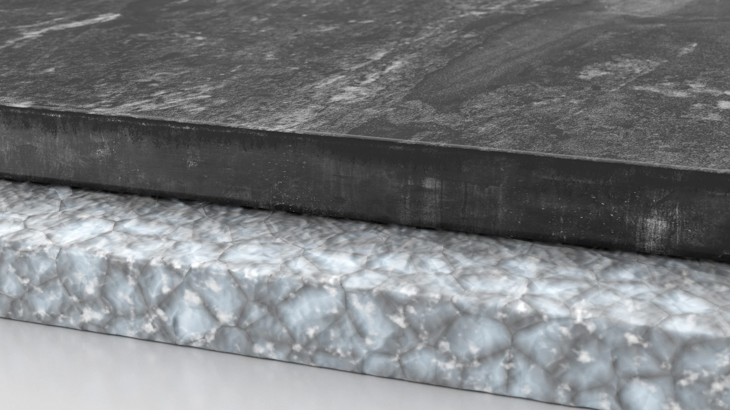 Close-up of two stacked surface materials: a dark, floor underlayment textured slab on top of a translucent, crystalline layer.