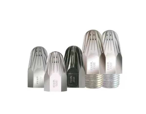 Five metal nozzle tips for fogging or spraying equipment arranged in a row.