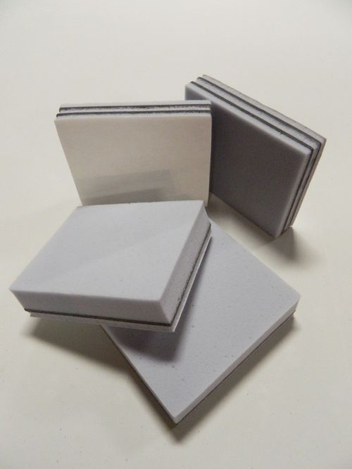 Cross-section of Memtech acoustic composite showing foam absorber, vinyl noise barrier, and decoupling layers