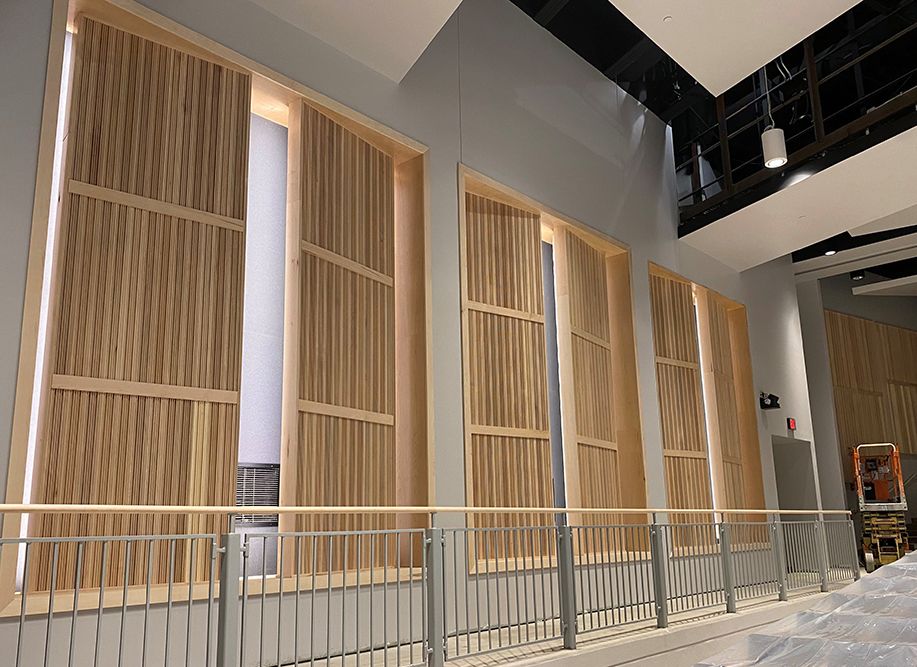 HighTones wood diffuser by Kinetics Noise Control, grooved hardwood planks with varying-depth wells for scattering high-frequency sound above 2,500 Hz.