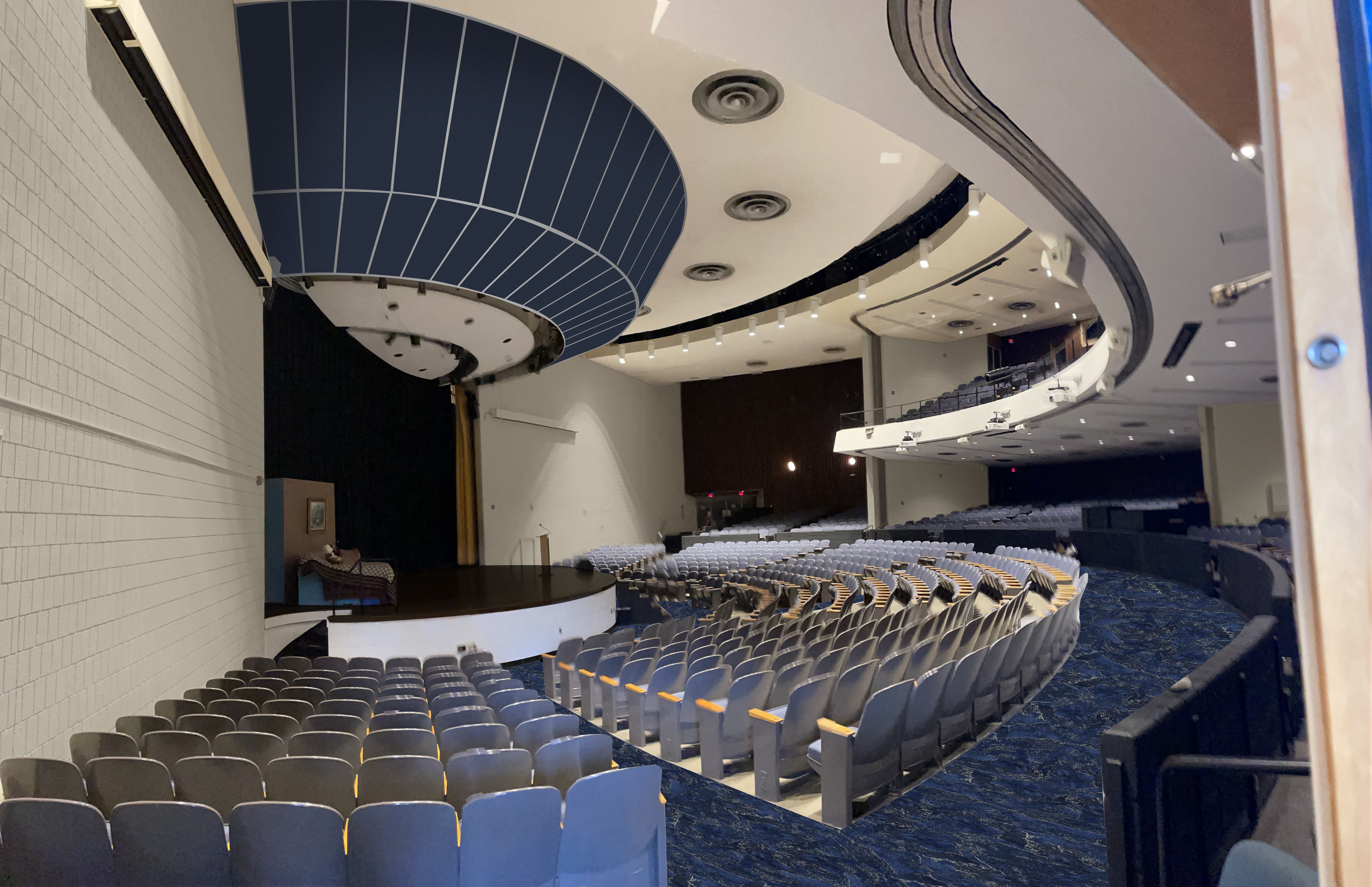 Acoustic panels mounted on an open ceiling