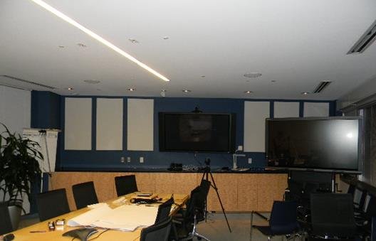 Field acoustic testing of a completed demising wall in a commercial office fit-out