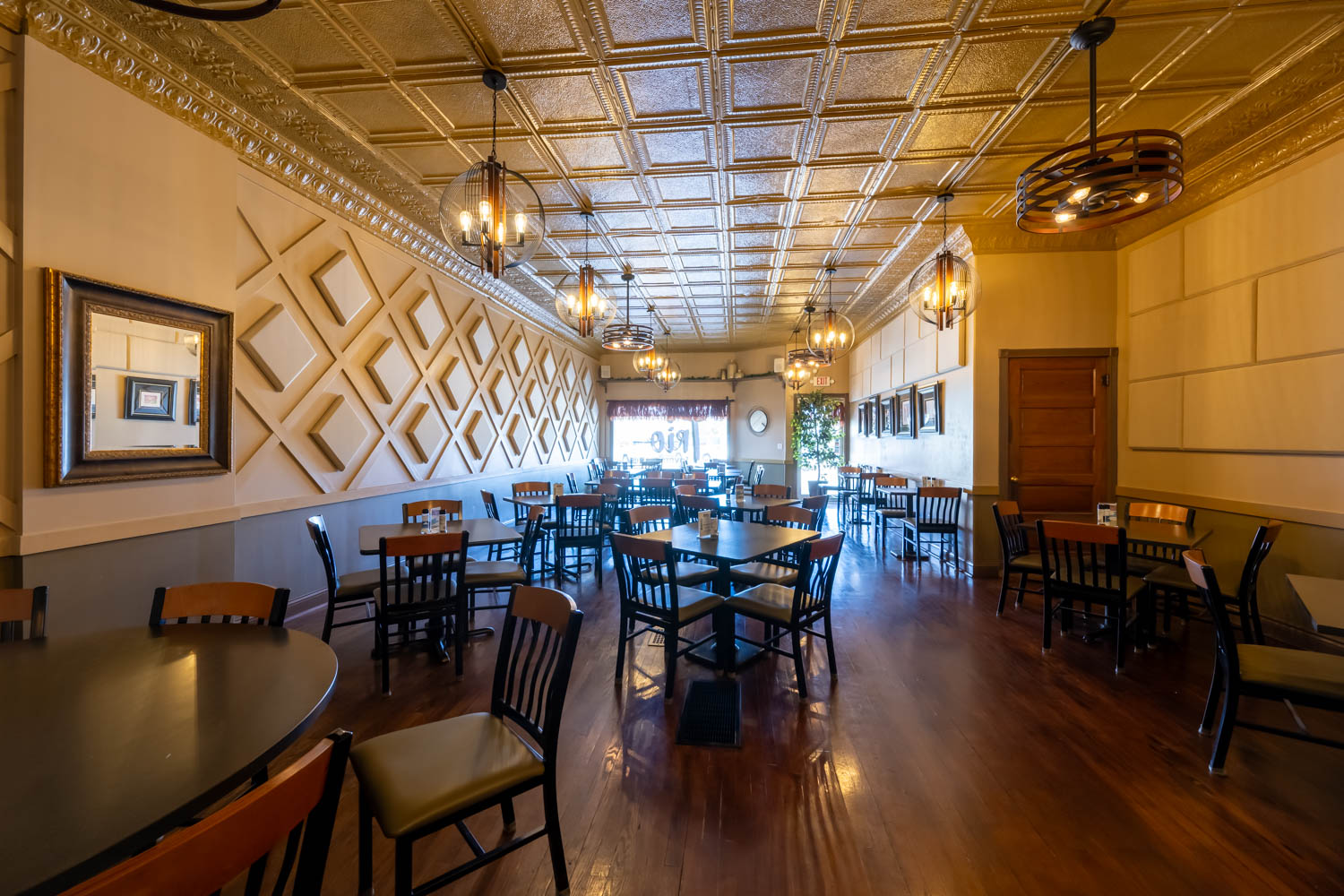 Restaurant interior with finish-integrated acoustic treatment