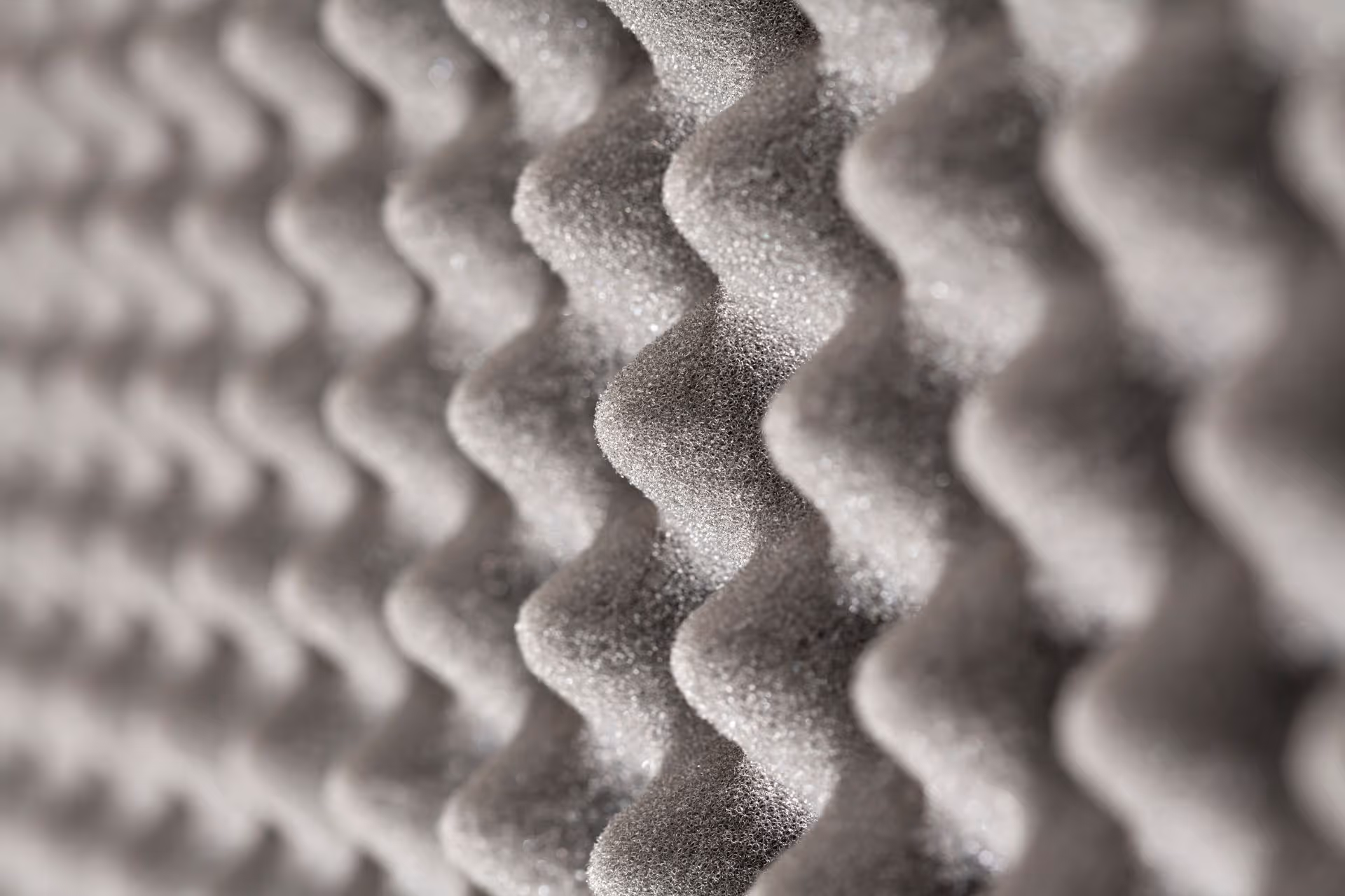 Image of grey sound-dampening foam (acoustic foam)