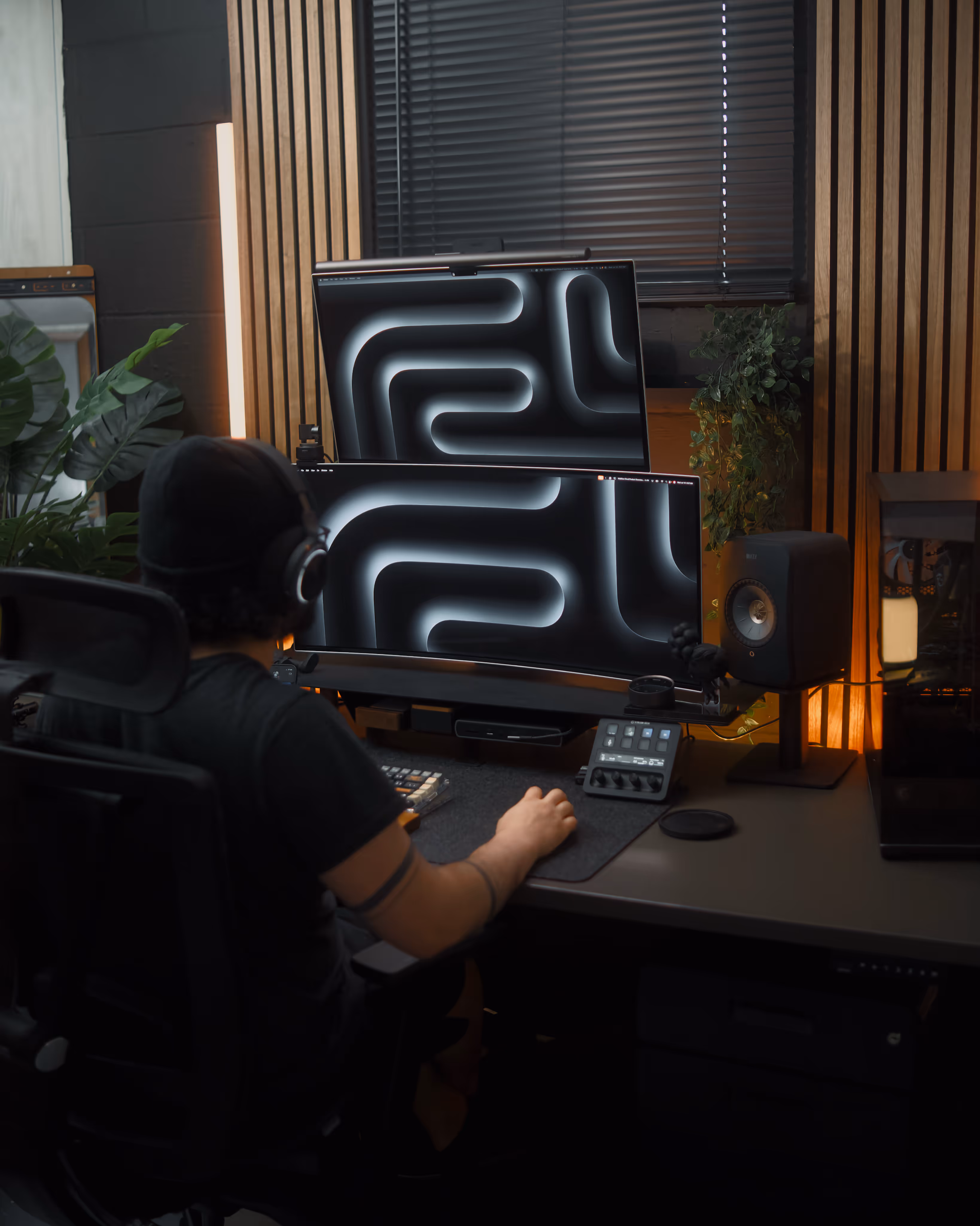 Justin sitting at his desk setup