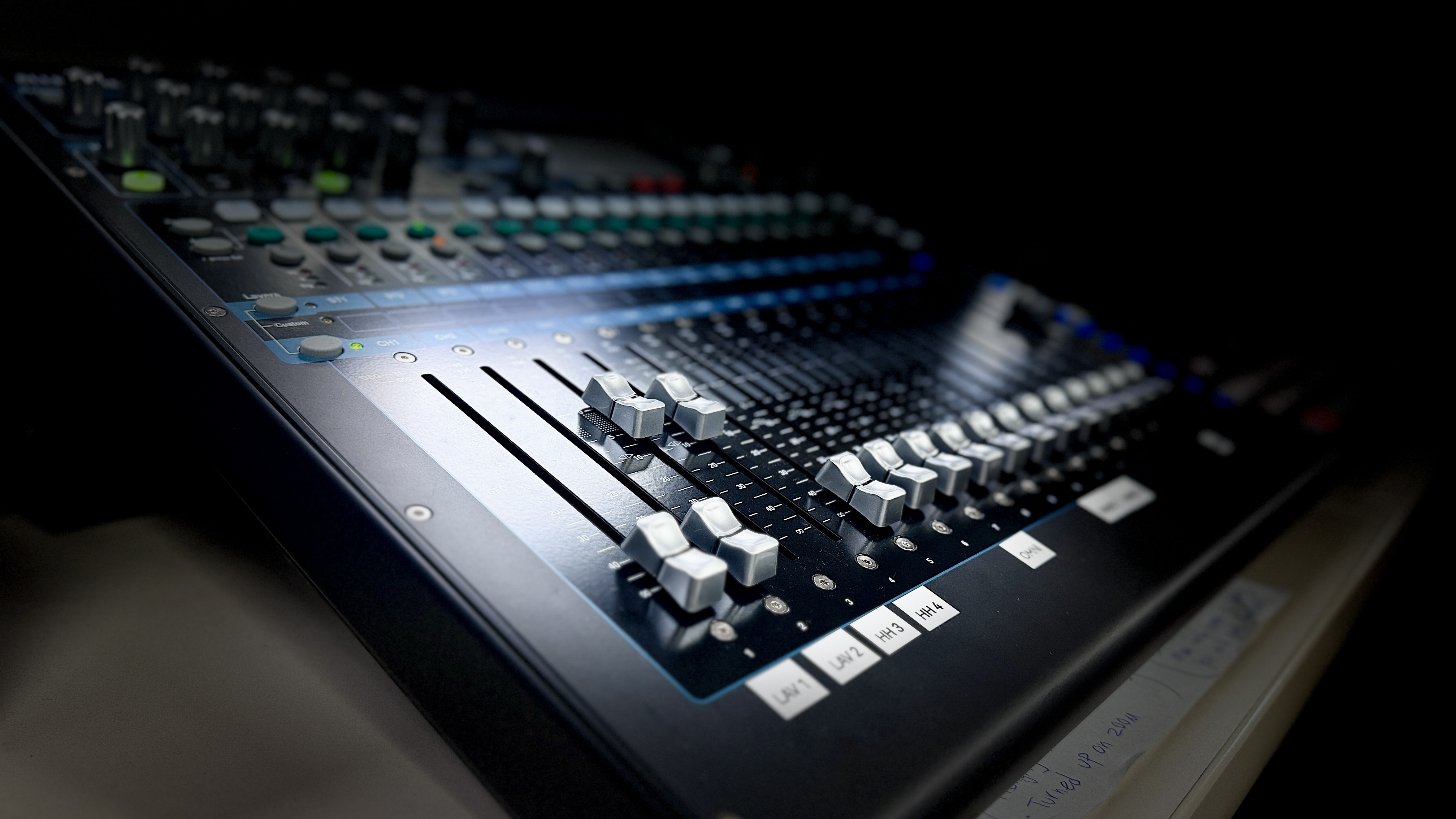 Professional audio mixing setup with Sennheiser wireless microphones for a corporate livestream event