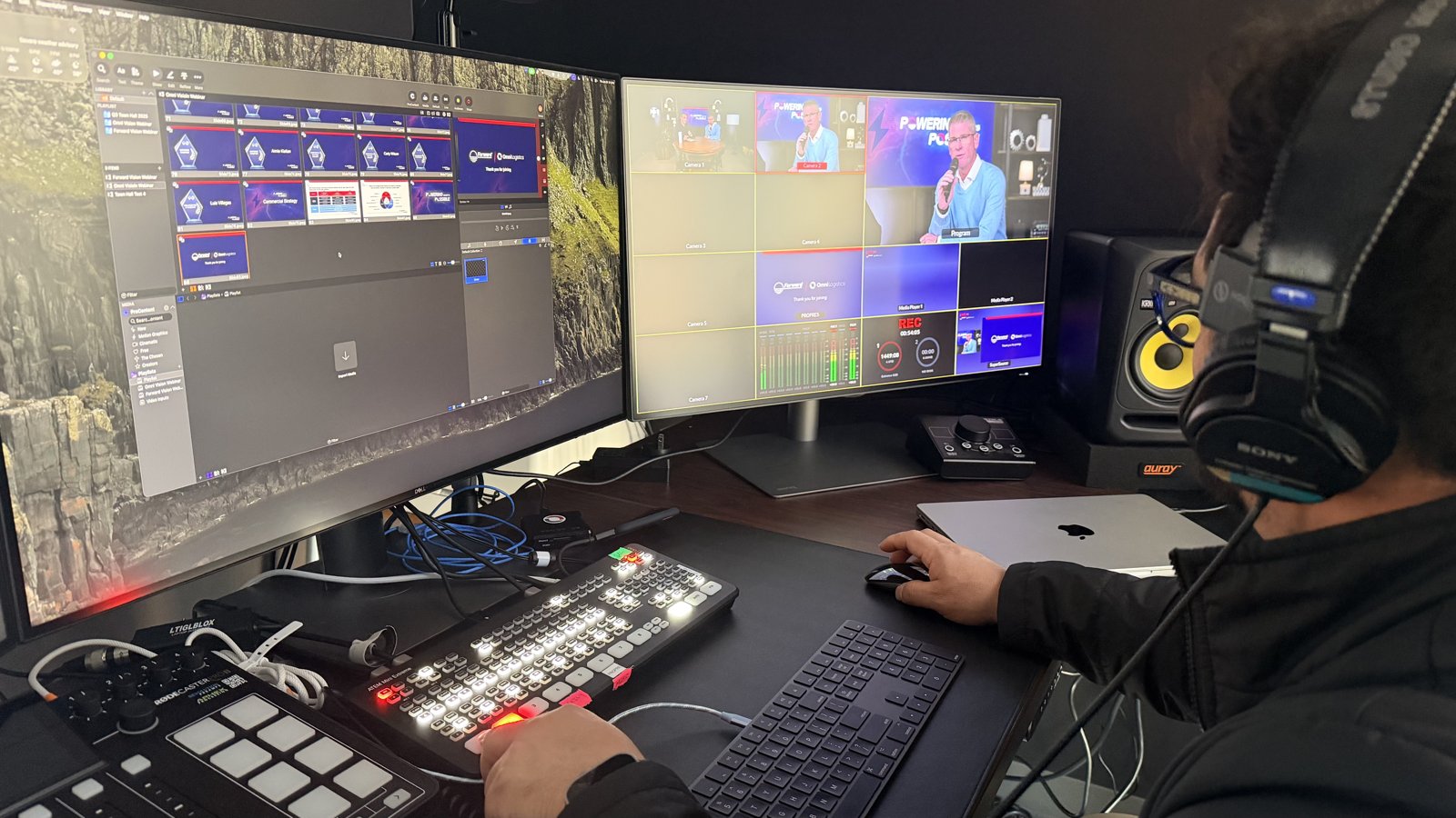 DFW Live Stream operator producing a corporate webinar at a dual-monitor switching station
