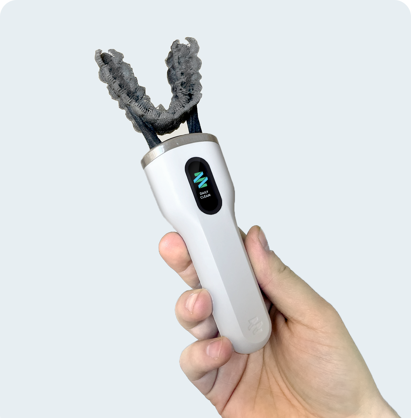 ZERObrush device held comfortably in hand