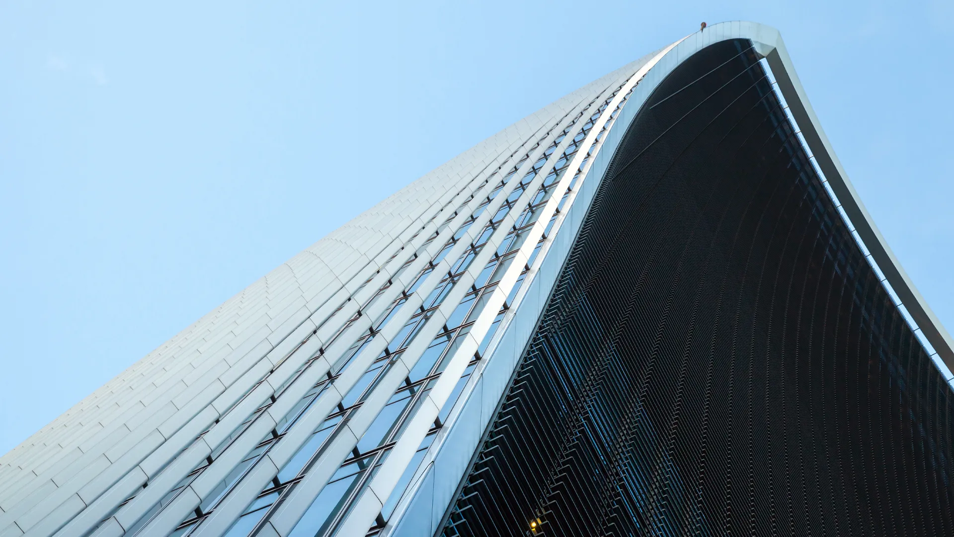 A very tall building with a sky background.