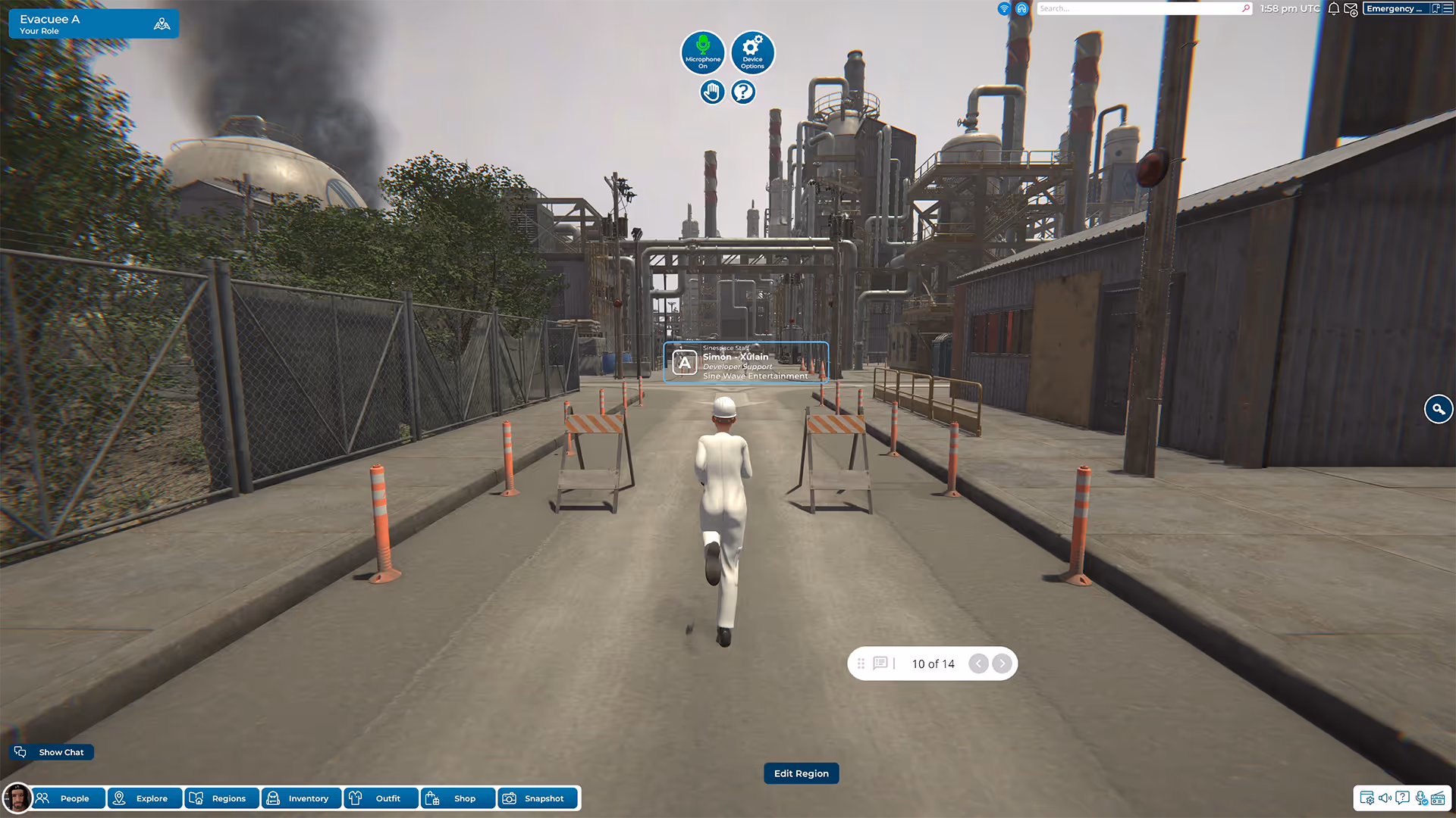 Breakroom avatar evacuating hydrogen plant during fire simulation, following safety protocol along designated path with visible on-screen UI