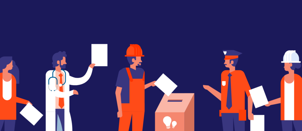 Collaborateurs déposant leurs idées dans une boîte