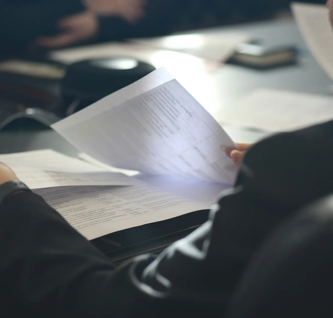 A person reviewing her documents