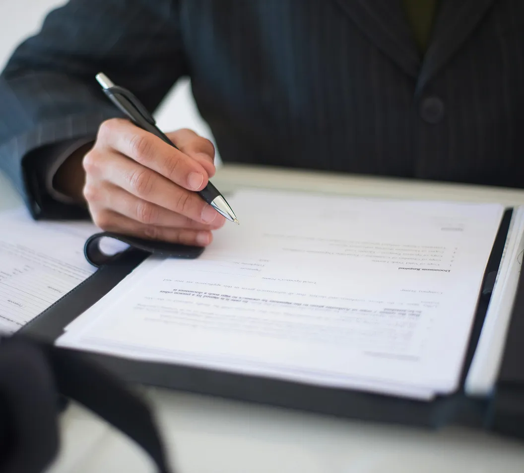 A person reviewing his documents