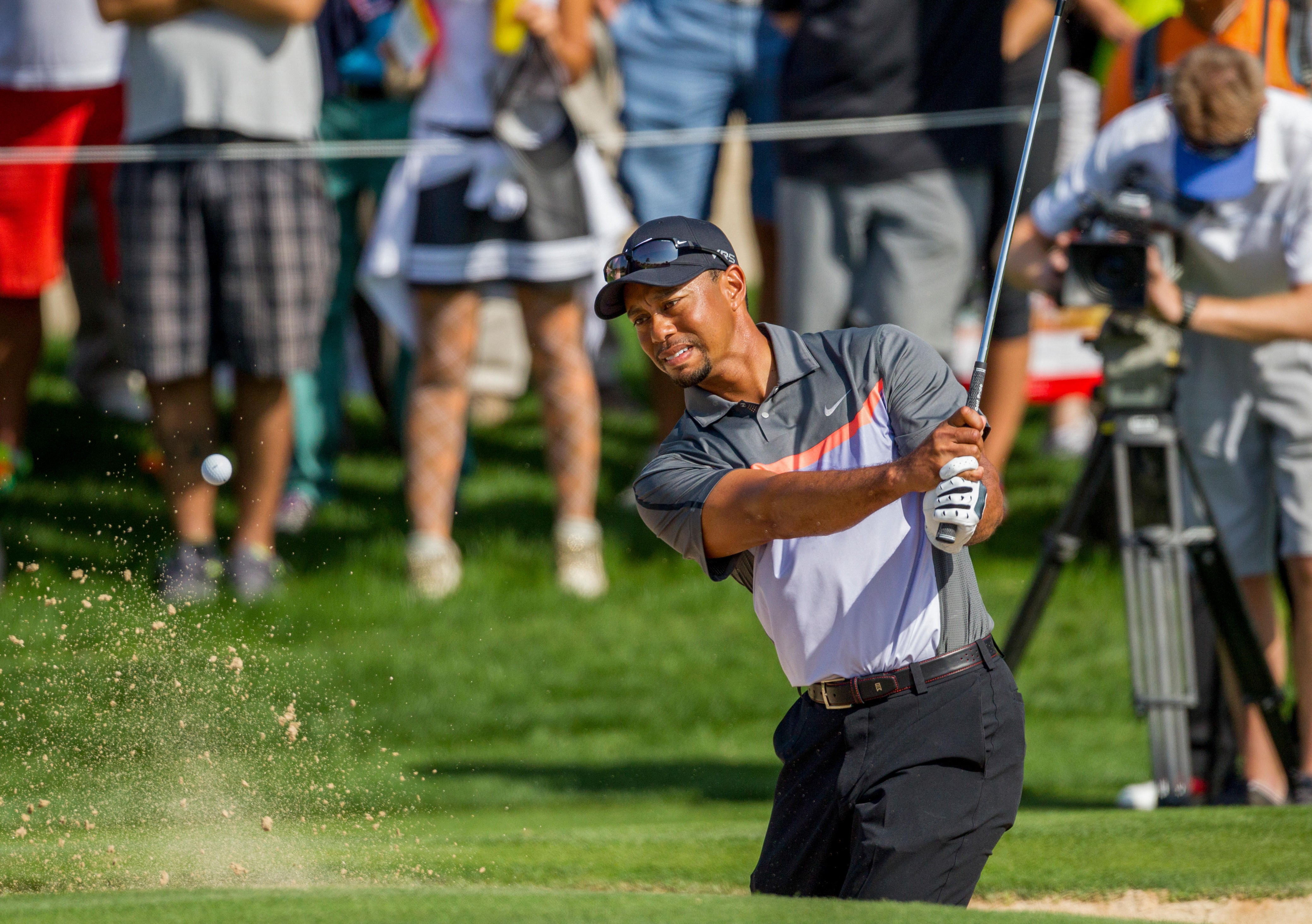 Golfer swinging club to symbolize mastery compared to IT companies using the same tools