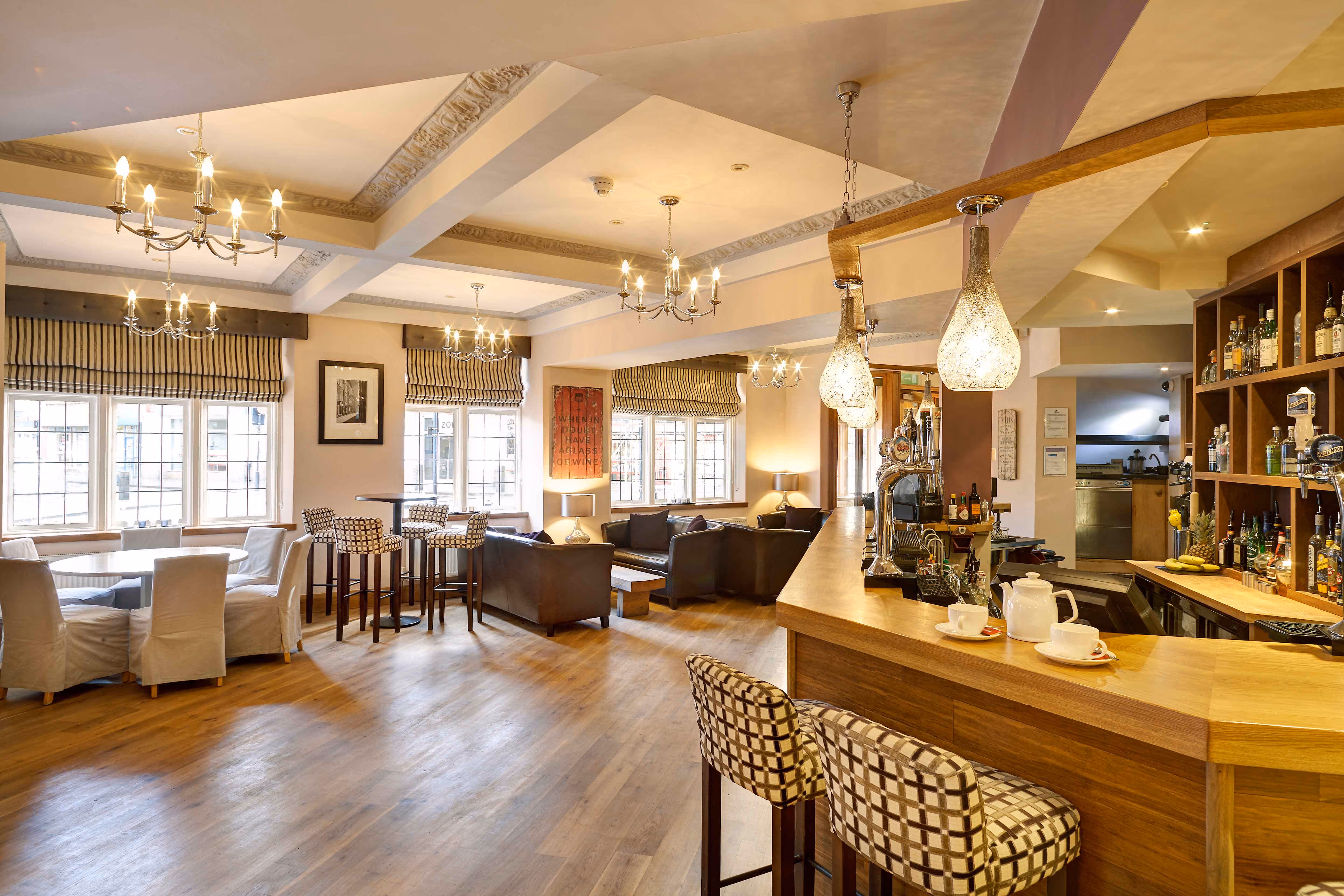 A photo of the interior of a modern bar