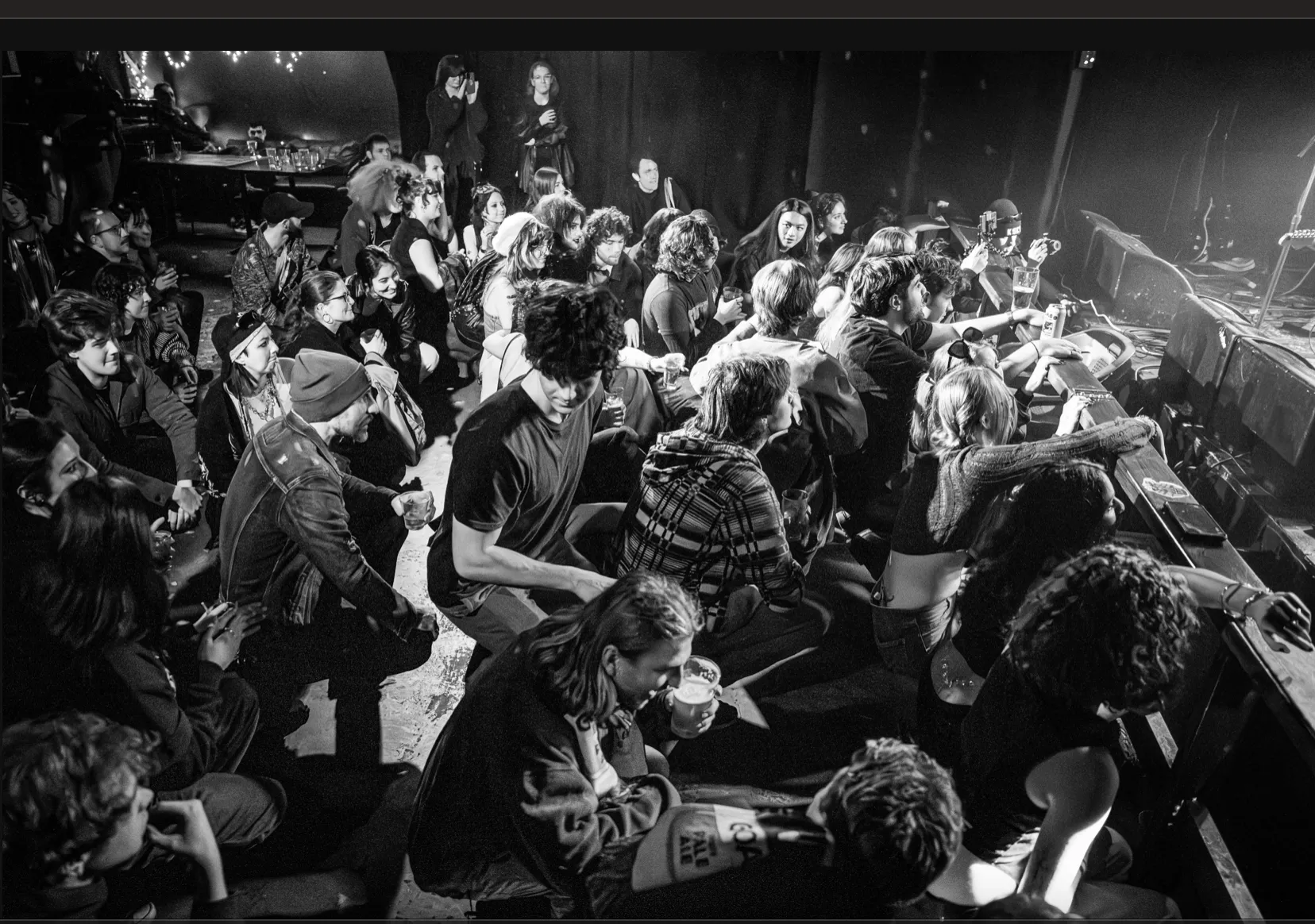 A black and white photo of a crowd of people.