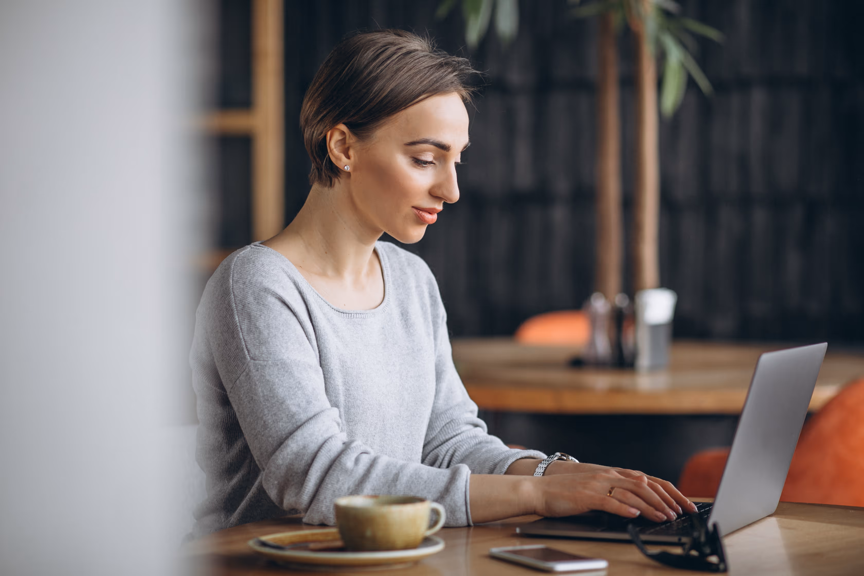 woman sitting in front of a computer