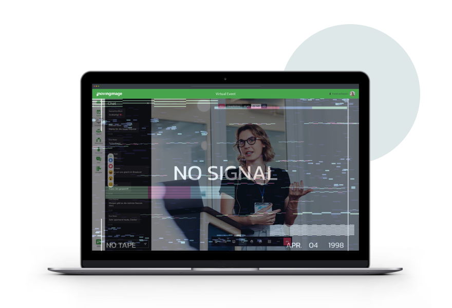 A laptop screen shows a movingimage virtual event livestream interrupted by a glitching 'no signal' error message.