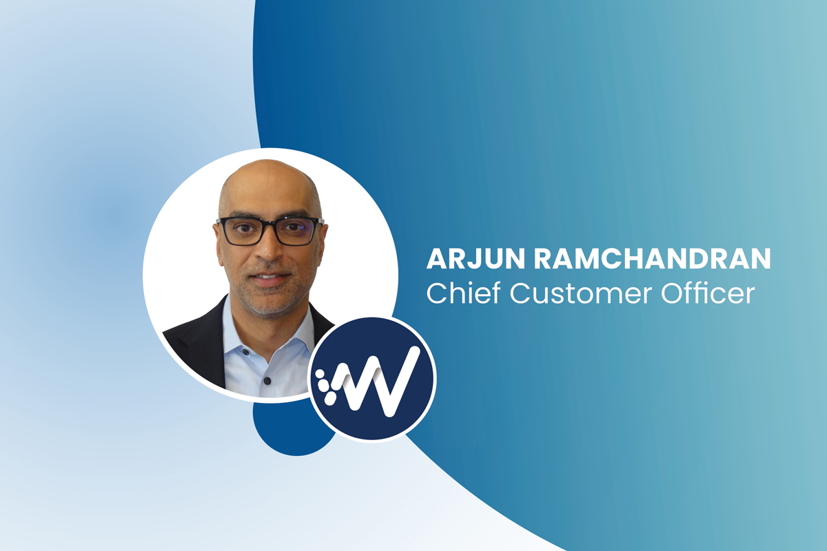 Bald executive in glasses with company logo on blue gradient background