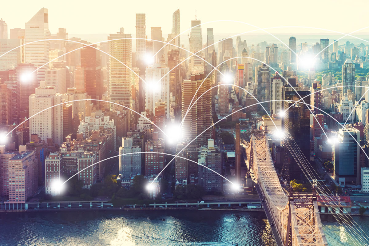 Connected urban landscape with glowing network lines over New York City