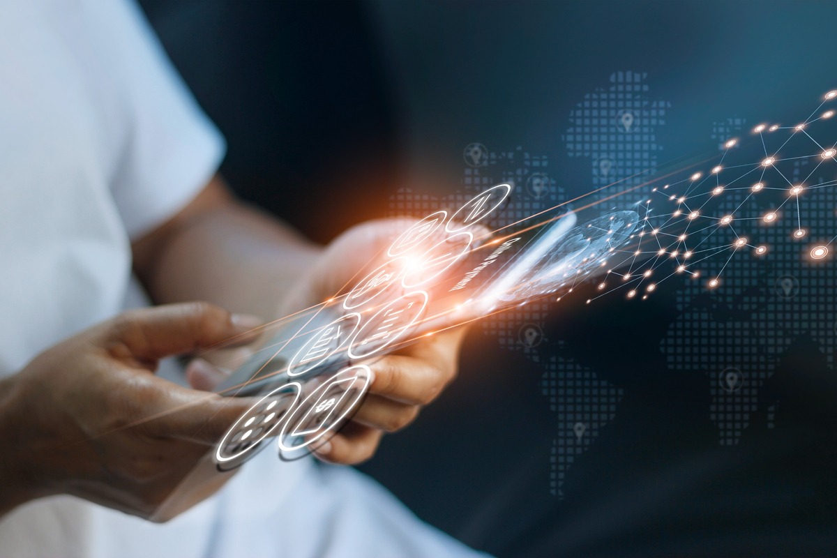 Hands interacting with futuristic digital network and glowing connectivity interface