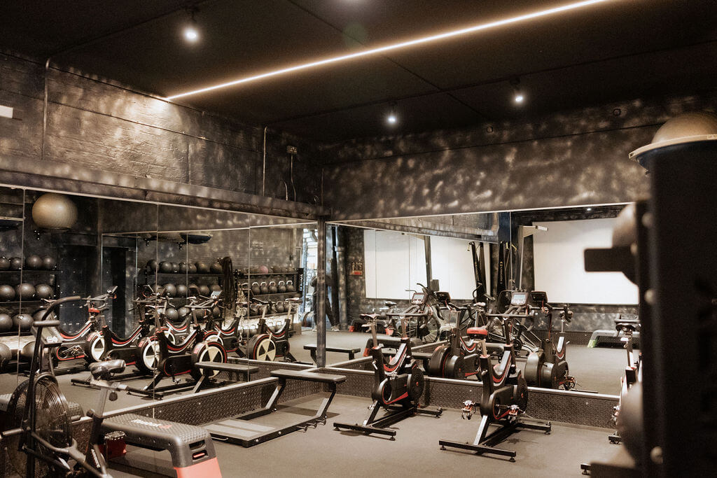 A serene yoga session taking place in a well-lit studio.