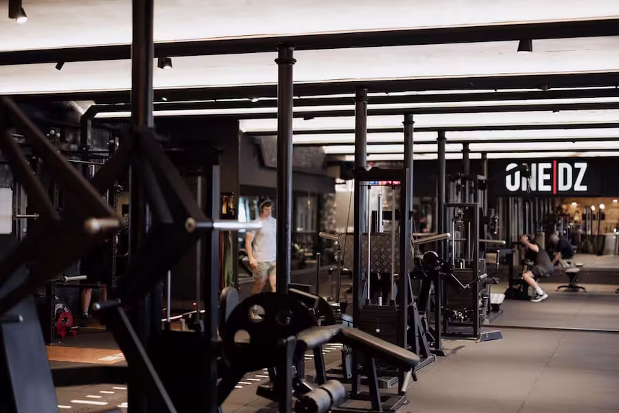 Gym floor with strength equipment at ONE|DZ Gym in Derby