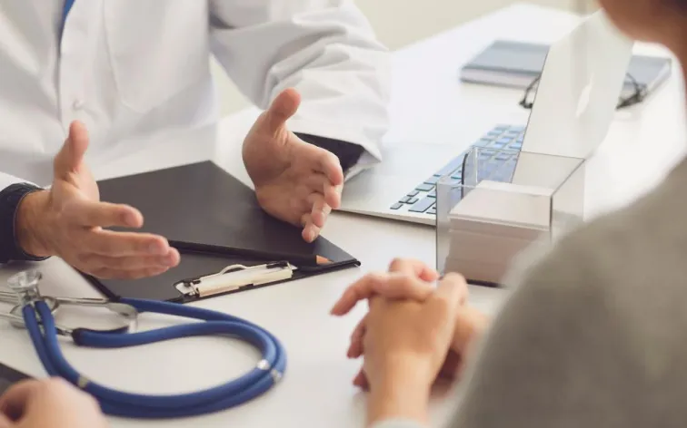 Doctor talking to patient