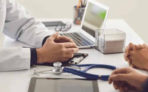 Doctor talking to patient