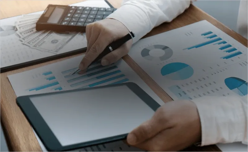 A doctor pointing to a printed out chart