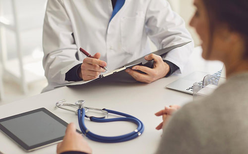 Doctor talking to patient