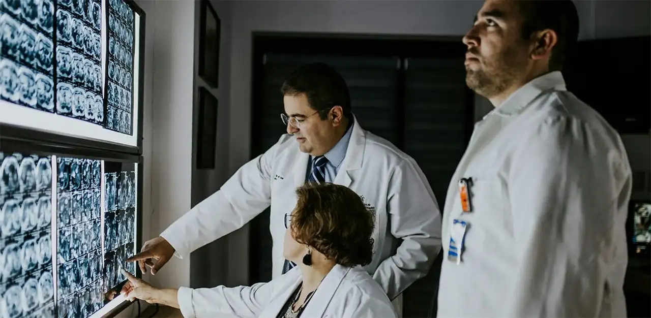 Doctors looking at x-rays together