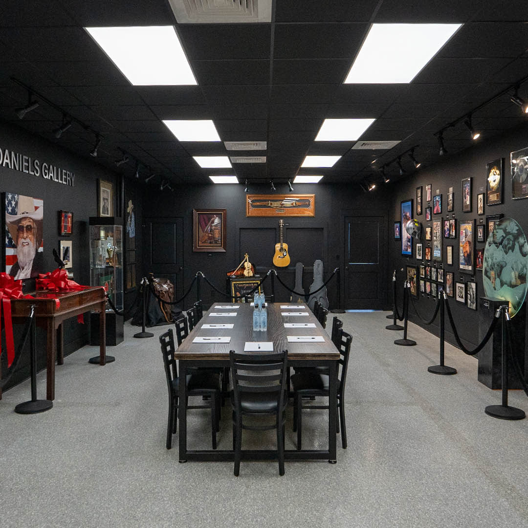 Daniels Gallery interior with guitars, photos, and meeting table