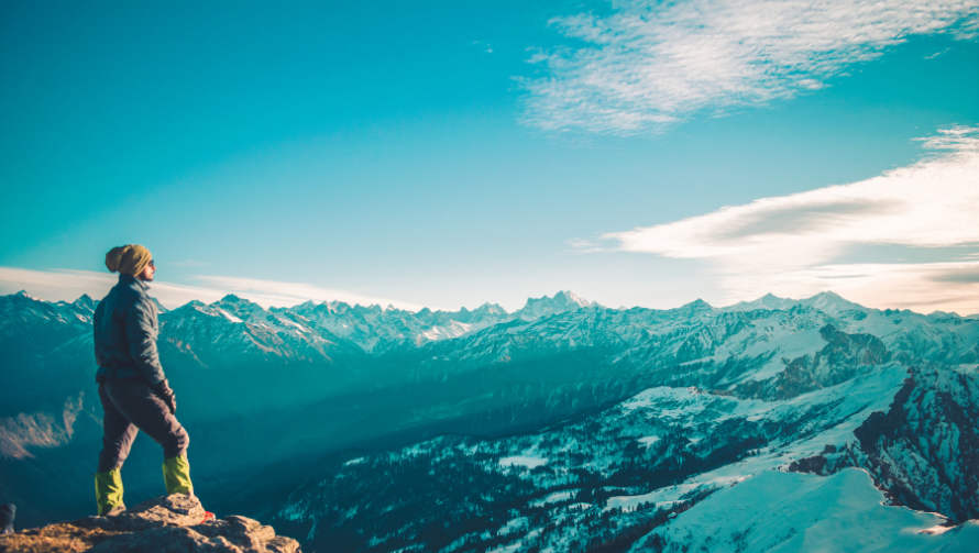 Person on Mountain Edge