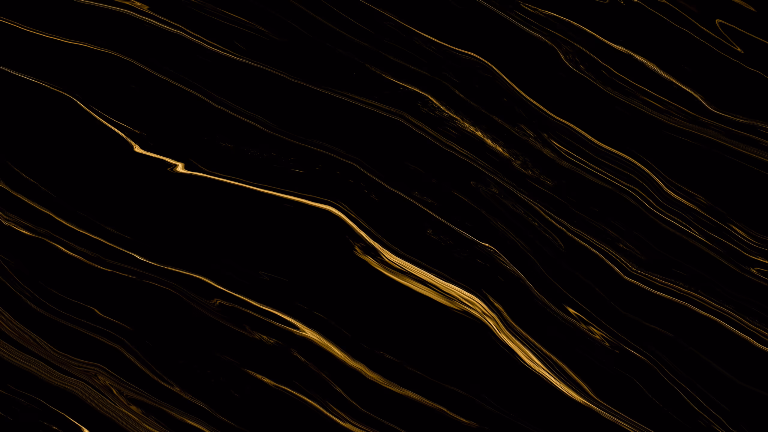 Crna mramorna tekstura s tankim zlatnim žilicama.