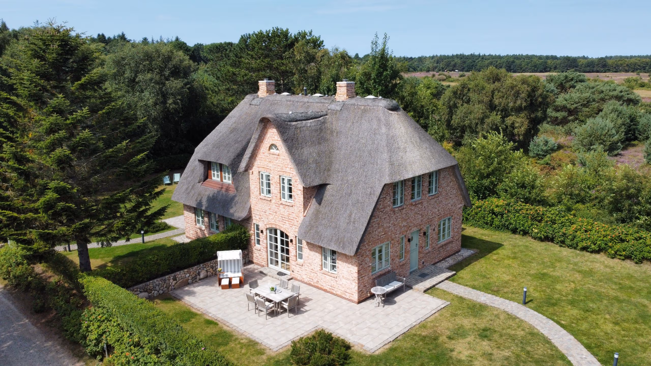 Reetdachhaus mit Garten in Nebel – Exklusives Luxus Ferienhaus Amrum