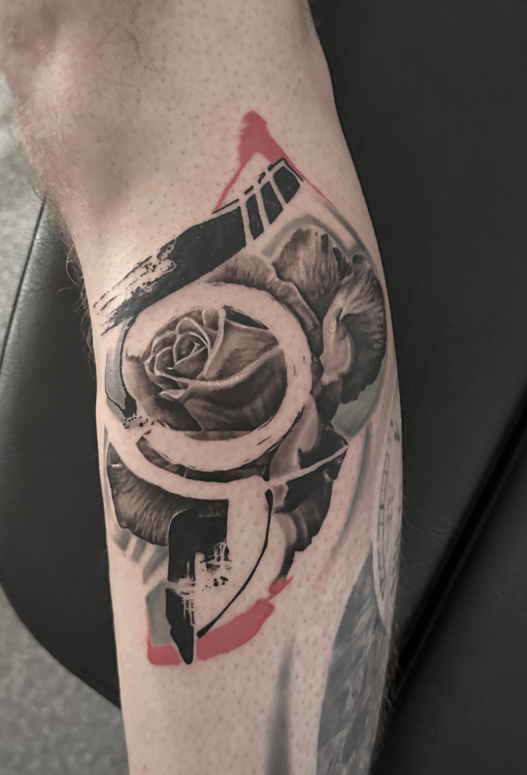 Inkpassion, Nahaufnahme eines abgeheilten Tattoos auf dem Unterarm, rechts